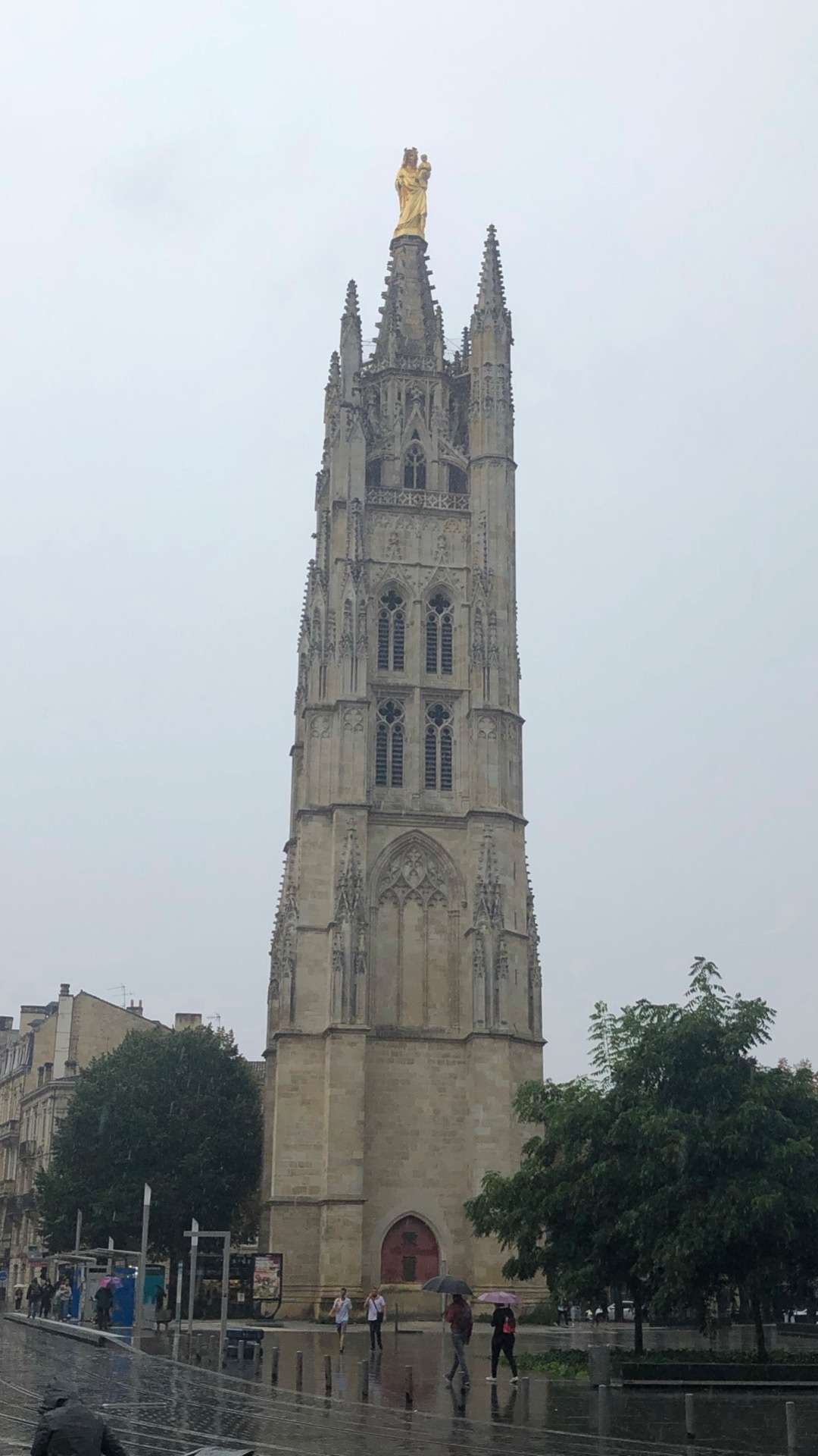 Tall spire of Church and Mary and child at the top